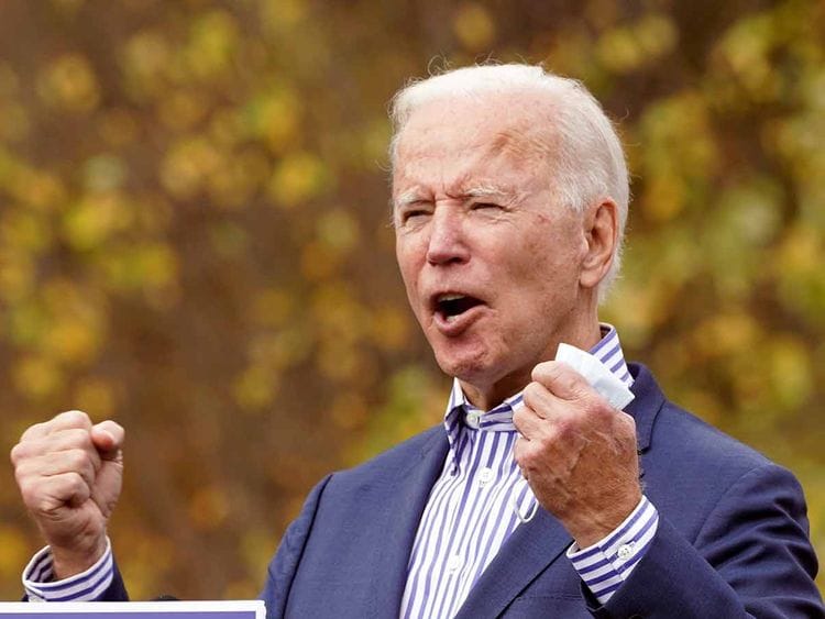 US president-elect Joe Biden speaks during a drive-in campaign event at Bucks County Community College in Bristol, Pennsylvania, US, October 24, 2020.