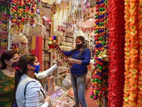 Photos: COVID-19, air pollution cut firecracker demand for Diwali