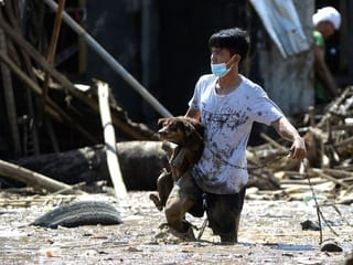 Photos: Philippines hunts for missing after its deadliest typhoon this year 