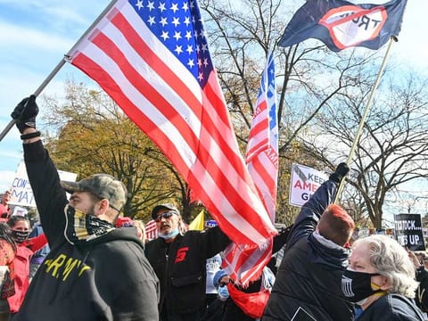 Anti-Trump and pro-Trump demonstrators square off at Black Lives Matter Plaza in Washington, DC, on November 13, 2020.