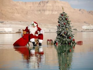 Photos: Santa brings Dead Sea to life with tree and cheer 