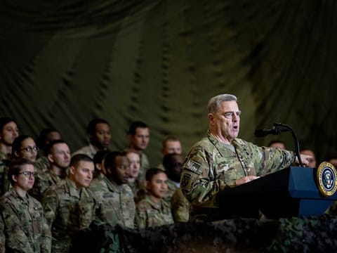 General Mark Milley, chairman of the Joint Chiefs of Staff, addresses troops at Bagram Airfield in Afghanistan on Nov. 28, 2019. President Donald Trump is expected to order the US military to withdraw thousands of troops from Afghanistan, Iraq and Somalia by the time he leaves office in January 2021. 