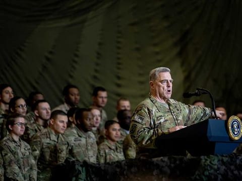 General Mark Milley, chairman of the Joint Chiefs of Staff, addresses troops at Bagram Airfield in Afghanistan on Nov. 28, 2019. President Donald Trump is expected to order the US military to withdraw thousands of troops from Afghanistan, Iraq and Somalia by the time he leaves office in January 2021. 