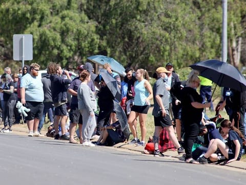 People are seen queuing at a COVID-19 testing site as the state of South Australia experiences an outbreak, in Adelaide, on November 17, 2020.  