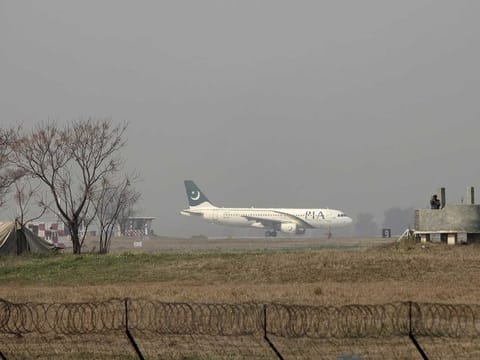A Pakistan International Airlines (PIA) passenger plane prepares to take off from the Benazir International airport in Islamabad, Pakistan, February 9, 2016. 
