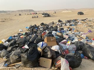 Photos: Careless campers leave garbage in the desert in Kuwait