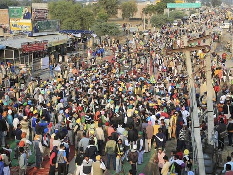 Members of various farmer organisations gather at Punjab-Haryana border as they participate in the 'Delhi Chalo' protest march against the farm reform laws, in Sirsa district, Thursday, Nov. 26, 2020. 