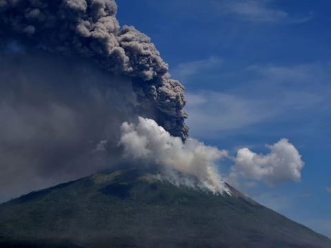 Volcano in eastern Indonesia erupts, thousands evacuated