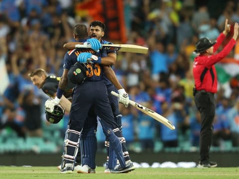  India's Hardik Pandya (back to camera) and Shreyas Iyer erupt after the T20 series win over Australia on Sunday.