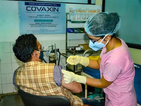 A medic administers Covaxin, developed by Bharat Biotech in collaboration with the Indian Council of Medical Research (ICMR), during the Phase- 3 trials at the People's Medical College in Bhopal, on December 7, 2020. 