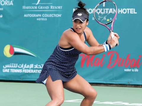 Heather Watson shapes for a backhand return against Kirsten Flipkens in second round of Al Habtoor Challenge Tennis on Wednesday.