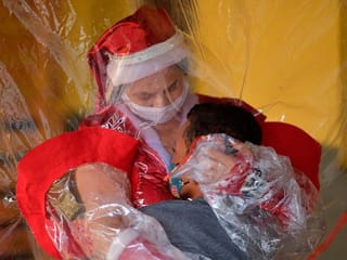 COVID-19, cancer can't stop Mrs Santa Claus in Brazil