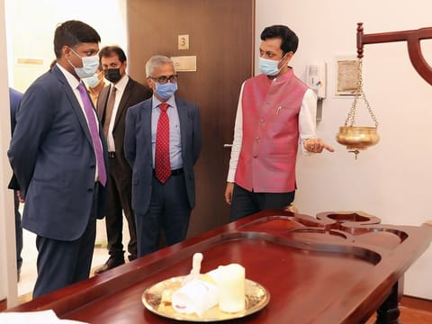 Dr. Shyam Vishwanathan explaining about the traditional curative therapies offered at ‘Vaidyashala’ to Sandeep Kumar Bayyapu after the inauguration.