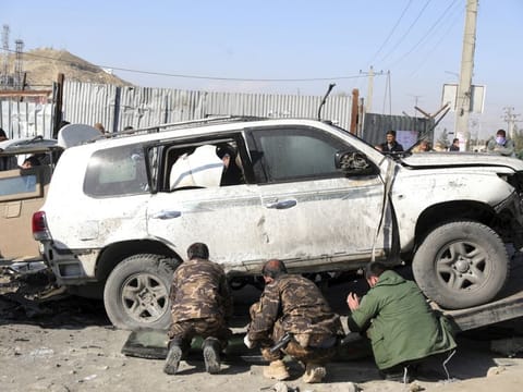 Afghan security personnel arrive at the site of a bomb attack in Kabul, Afghanistan, Tuesday, December 15, 2020. A bombing and a shooting attack on Tuesday in the Afghan capital of Kabul killed a few people, including a deputy provincial governor, officials said.(AP Photo/Rahmat Gul)