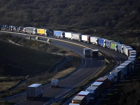 The Dover Traffic Access Protocol (TAP) scheme on the A20 is seen in action as freight lorries queue on the main route into the port of Dover on the south coast of England on December 17, 2020.