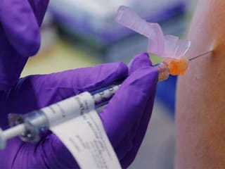 In Pictures: COVID-19 vaccines roll out around the world
