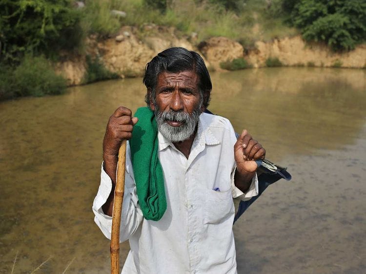 Kalmane Kamegowda, a 72-year-old shepherd pond man India Karnataka