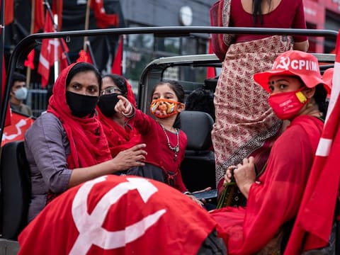 Communist Party of India (Marxist) supporters join a procession to celebrate their win in the local body elections in Kochi, on December 16, 2020. 