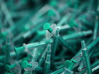 Photos: German factory races to churn out COVID-19 syringes