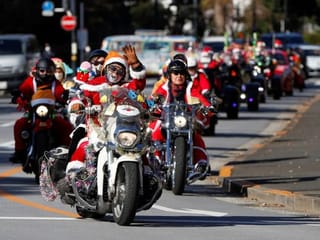 Photos: Santa Claus bikers parade in Tokyo against child abuse