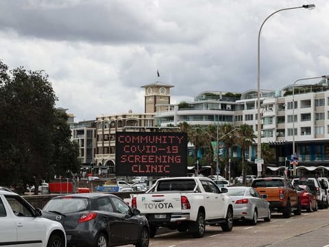 Vehicles queue at the Bondi Beach drive-through coronavirus disease (COVID-19) testing centre in the wake of an outbreak in Sydney, Australia, December 22, 2020. 