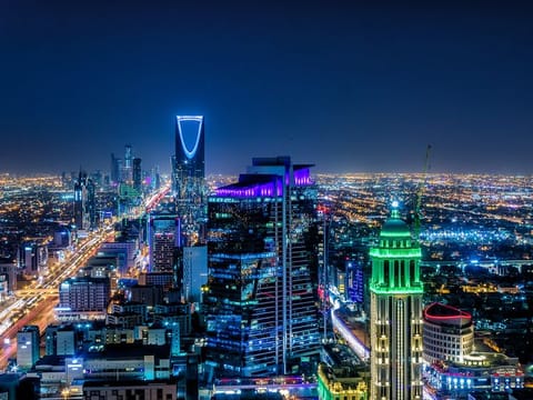 Riyadh city skyline at night. In addition to promoting economic growth, the tax exemption programme contributes to enhancing Saudi Arabia’s competitiveness on the global stage.