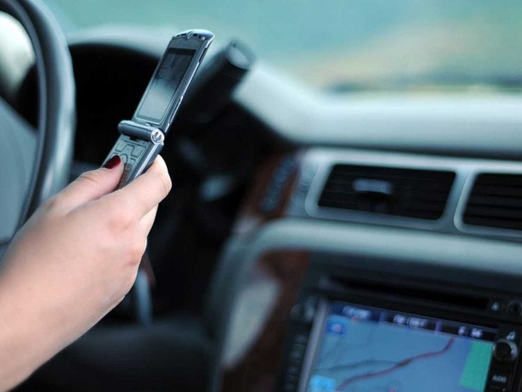 Driving and using the mobile phone