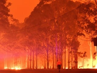 Photos: Australian beach towns ablaze as wildfire crisis intensifies