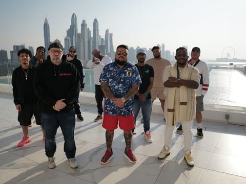 British DJ and radio host Charlie Sloth (centre) with Bigg Hass (left) and rappers who are participating in ‘Fire in the Booth: The Dubai Series’.
