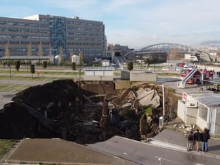 Photos: Giant sinkhole consumes cars in Naples hospital parking lot