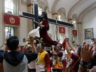 Photos: Devotees flock to Philippine church to attend Nazarene feast