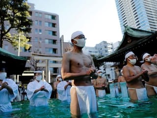 Japanese pray for an end to the pandemic in annual ice bath ritual at Tokyo shrine