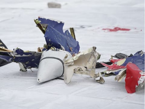 Debris recovered from the Sriwijaya Air SJ 182 crash site sits on the dockside at Tanjung Priok Port in Jakarta. 
