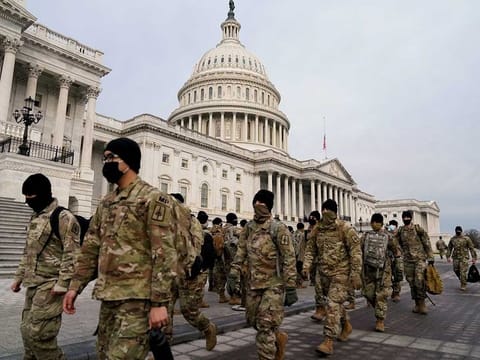 Members of the National Guard arrive to the US Capitol days after supporters of US President Donald Trump stormed the Capitol in Washington, US, January 11, 2021. 