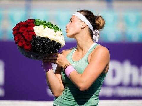 Aryna Sabalenka with the Abu Dhabi WTA Women's Open trophy