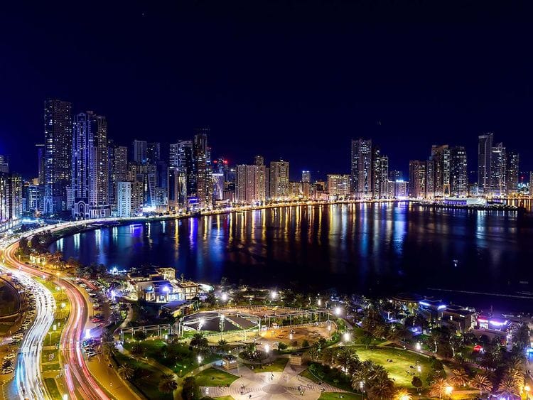 Stock Buhairah Corniche and Sharjah Skyline