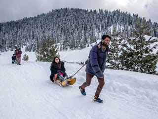 Photos: Snow fills Kashmir resort with tourists again