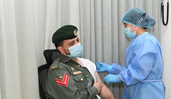 Dubai Police personnel receive COVID-19 vaccine (5)-1611145010423