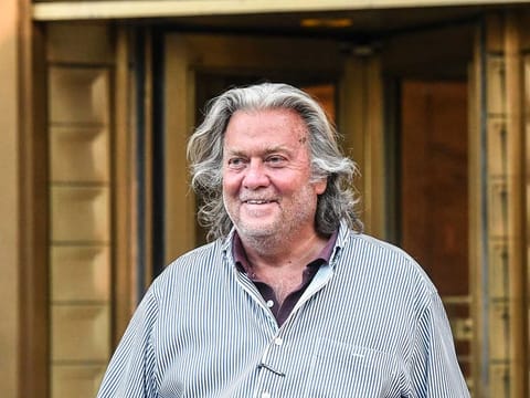 Former White House chief strategist Steve Bannon exits Manhattan Federal Court on Aug. 20, 2020, in New York City. On the morning of Jan. 20, 2021, with hours left in his presidency, Donald Trump pardoned Bannon, who was accused of federal fraud and money laundering. 