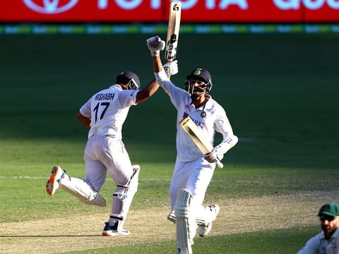 India's Rishabh Pant and Navdeep Saini celebrate victory over Australia at the Gabba in Brisbane
