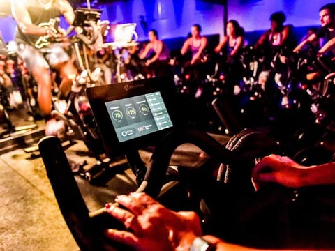 An indoor cycling class for Peloton in New York, Sept. 8, 2016. The bike’s tablet has a built-in camera and microphone, allowing users to see and hear one another if they choose. 