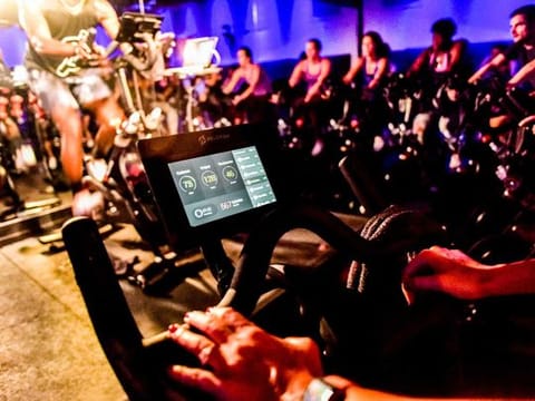 An indoor cycling class for Peloton in New York, Sept. 8, 2016. The bike’s tablet has a built-in camera and microphone, allowing users to see and hear one another if they choose. 