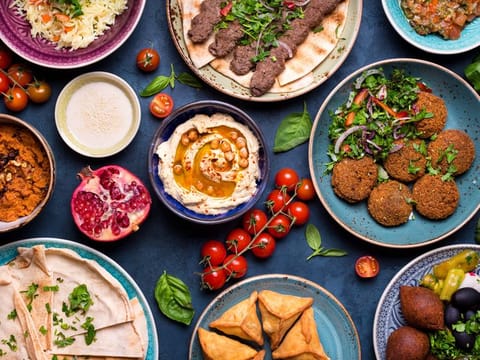 Today’s Middle Eastern cuisine - and it's much more than the much-disputed hummus - was shaped by a buffet of politics, immigration, invasions and ancient empires. 