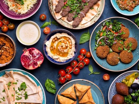 Today’s Middle Eastern cuisine - and it's much more than the much-disputed hummus - was shaped by a buffet of politics, immigration, invasions and ancient empires. 