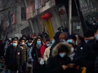 Photos: Long lines as Beijing expands mass COVID-19 testing