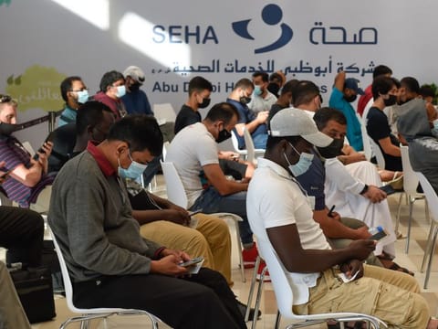 Residents wait for their turn at SEHA's COVID-19 Vaccination Centre at Mina Rashid in Abu Dhabi. 