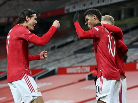 Manchester United celebrate against Liverpool