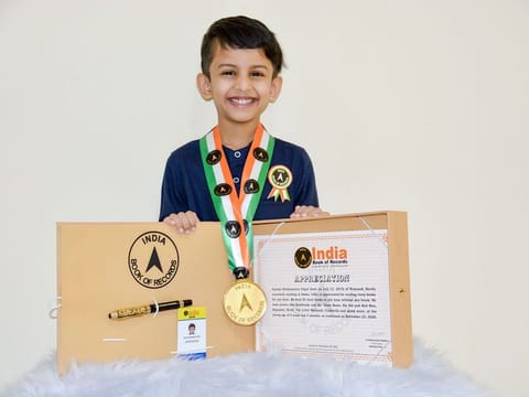 Aayush K. S. is listed under ‘Appreciation for reading story books for one hour without any break’ at the age of five years and three months.
