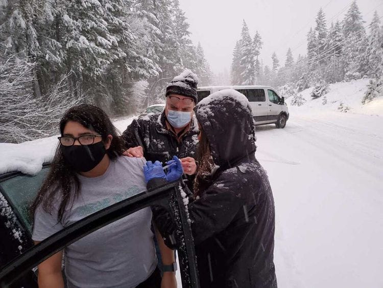 Oregon vaccination snowstorm US covid