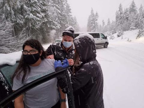 An impromptu roadside vaccination in rural southern Oregon during a snowstorm, when public health workers realised their remaining doses of vaccine would expire while they were stranded. 